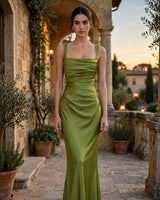 Calanthe olive satin maxi dress – villa courtyard at golden hour