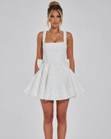 Dorothy ivory sequin square neck bow mini dress, front studio view