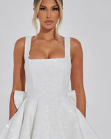 Square neckline and strap detail