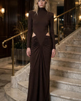 Elise coffee brown high-neck cut-out maxi dress — hotel marble staircase