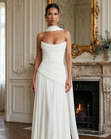 Kensington ivory maxi dress worn in a classical room with a marble fireplace