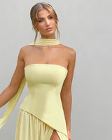 Neck scarf and strapless neckline detail