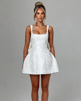 Orla ivory jacquard bow mini dress, front studio view