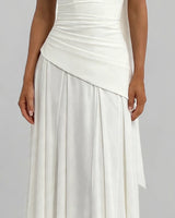 Asymmetric diagonal waist seam detail in ivory