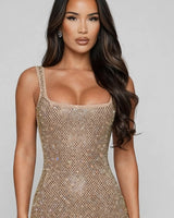 Scooped neckline and wide strap detail