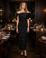 Pia black bow crystal bandage maxi dress worn at an evening dinner