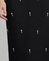 Close-up of teardrop crystal drops on the skirt