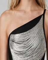 Close-up of silver strand drape across the bust
