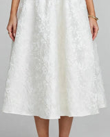 Floral jacquard fabric and gathered waist detail