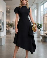 Odette black asymmetric high-neck brooch maxi dress — art gallery