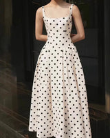 Zola ivory polka dot maxi dress — worn front view