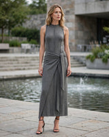 Zaina grey wrap-sash jersey maxi dress worn at a gallery plaza