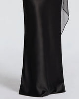 Glossy black satin skirt with fishtail hem detail