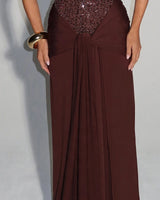 Pointed hem and knot drape detail