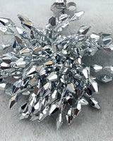 Left earring cluster detail