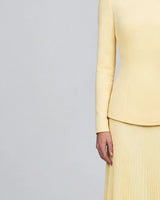 Close-up of the long fitted sleeve