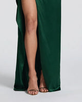 Glossy emerald satin skirt detail