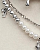 Cross charm detail