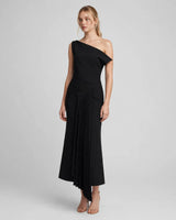 Aria black asymmetric shoulder pleated midi dress — studio side view