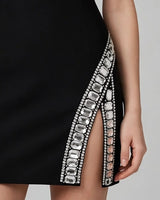 Crystal-trimmed diagonal slit detail