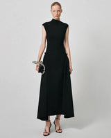 Paloma black high-neck silver-clasp pleated maxi dress — studio front