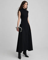 Paloma black high-neck silver-clasp pleated maxi dress — studio side view