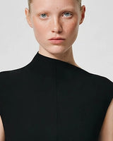 High neckline detail