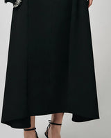 Pleated skirt detail