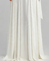 Flowing pleated chiffon skirt detail in ivory
