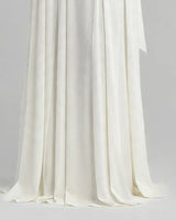 Ivory chiffon maxi hem detail