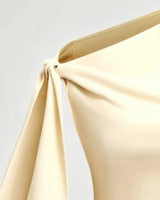 Knotted shoulder sash detail