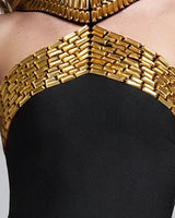 Chevron gold-stone bodice detail