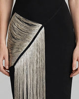 Gold fringe hip panel detail