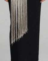 Long gold fringe detail
