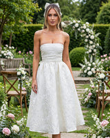 Saoirse ivory midi dress worn at a garden wedding