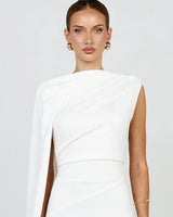 Close-up of the asymmetric folded shoulder drape