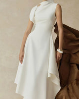 Odette white asymmetric high-neck maxi dress — worn front view