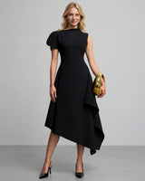 Odette black asymmetric high-neck brooch maxi dress — studio front