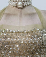 Sheer halter neckline detail
