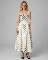 Zola ivory polka dot maxi dress — studio front