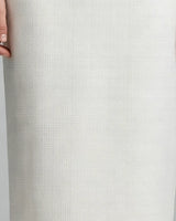 Close-up of ivory tweed fabric texture